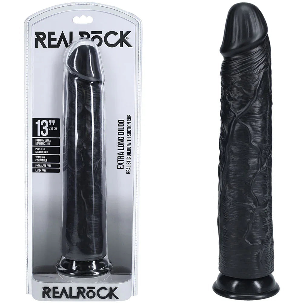 REALROCK 33 cm Extra Long Dildo in Black, blister pack beside the long veined dildo