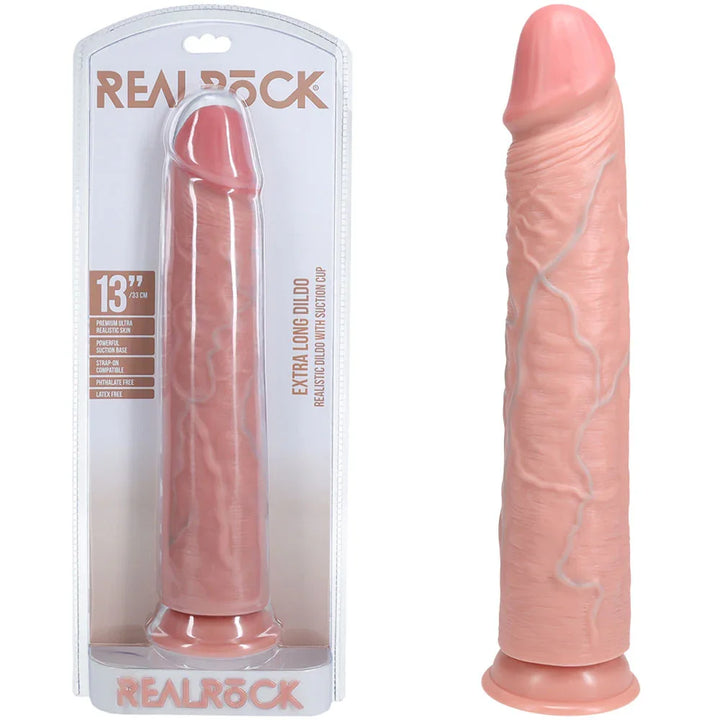 REALROCK 33 cm Extra Long Dildo in Flesh, blister pack beside the long veined dildo