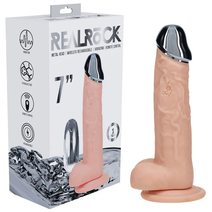 REALROCK 19 cm Metal Head Vibrating Dildo in Flesh, retail box beside the dildo with a chrome head