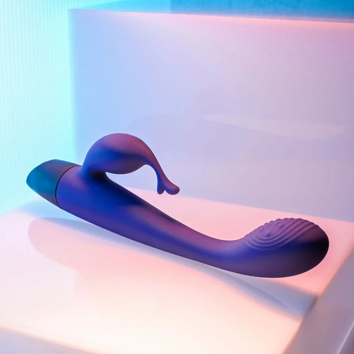 Plum Passion lying with the black base to the left and the dotted tip right