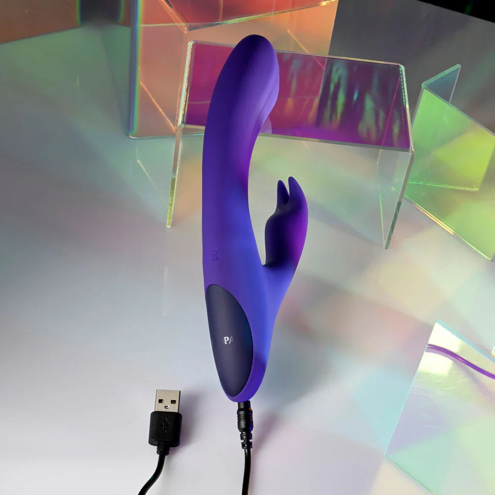Poseable Bunny with its USB charging cable plugged into the handle