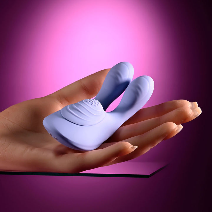 Handsy stimulator held in a hand to show its size