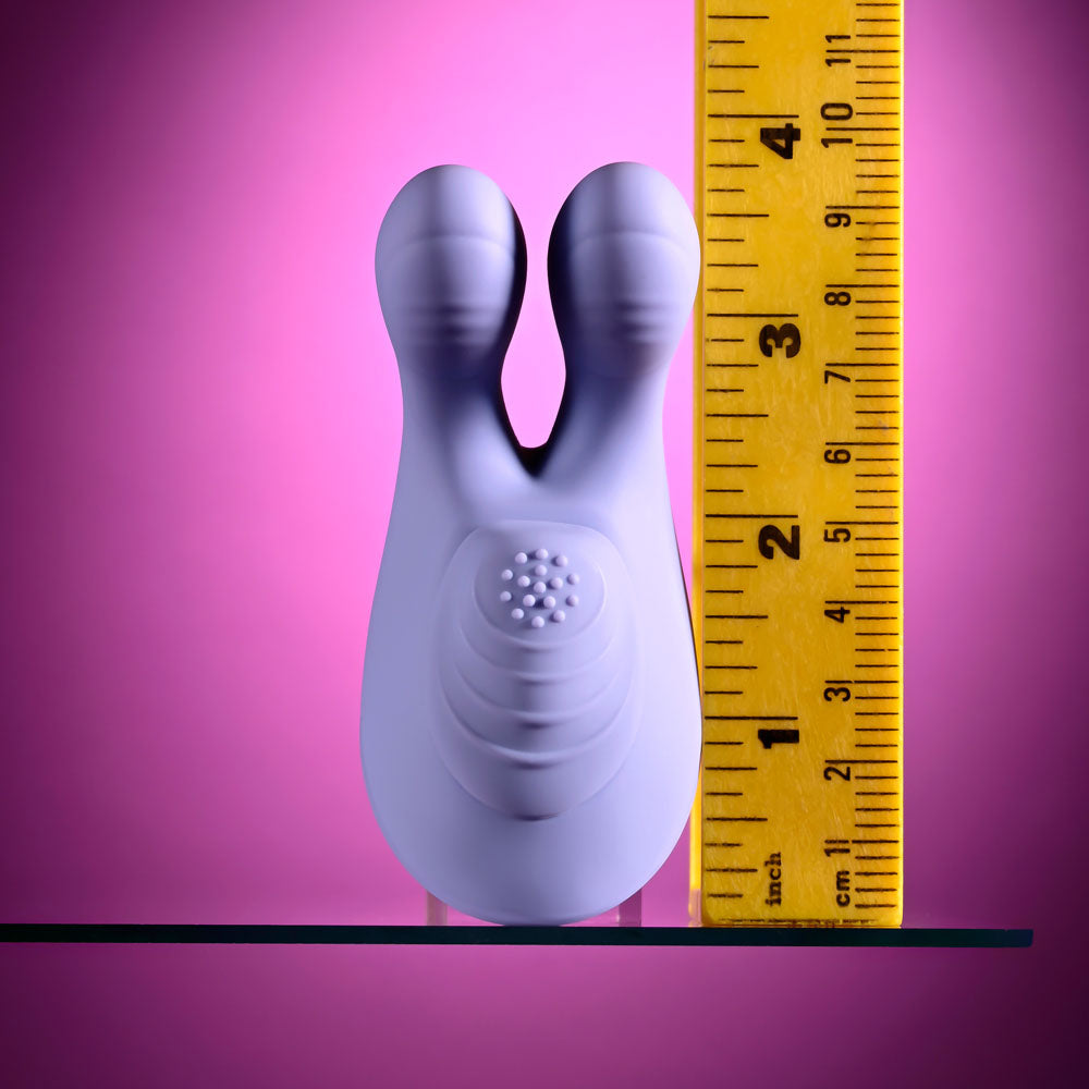 Handsy stood beside a ruler to show its length