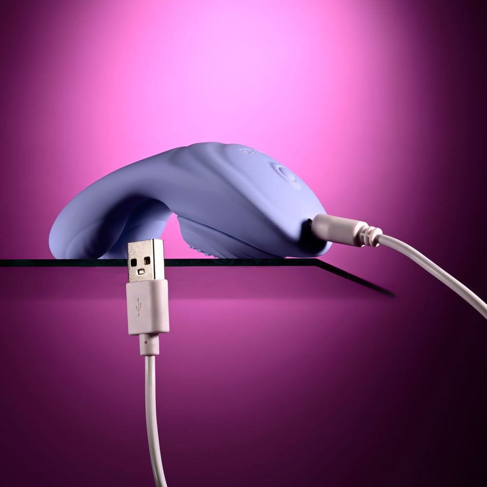 Handsy with its USB charging cable connected at the side