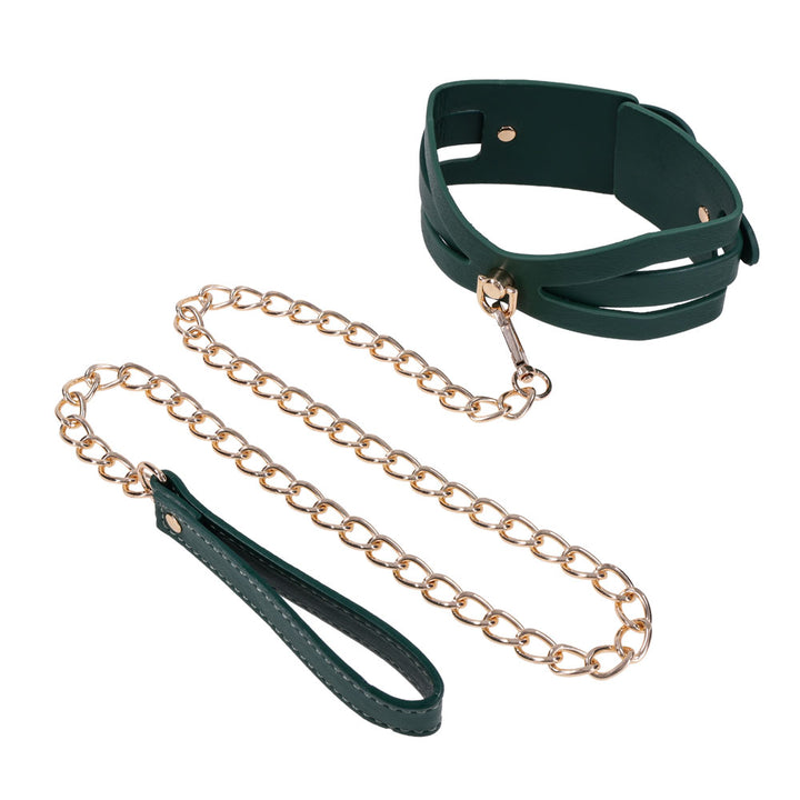 Indica cutout collar upright with the gold chain leash coiled below