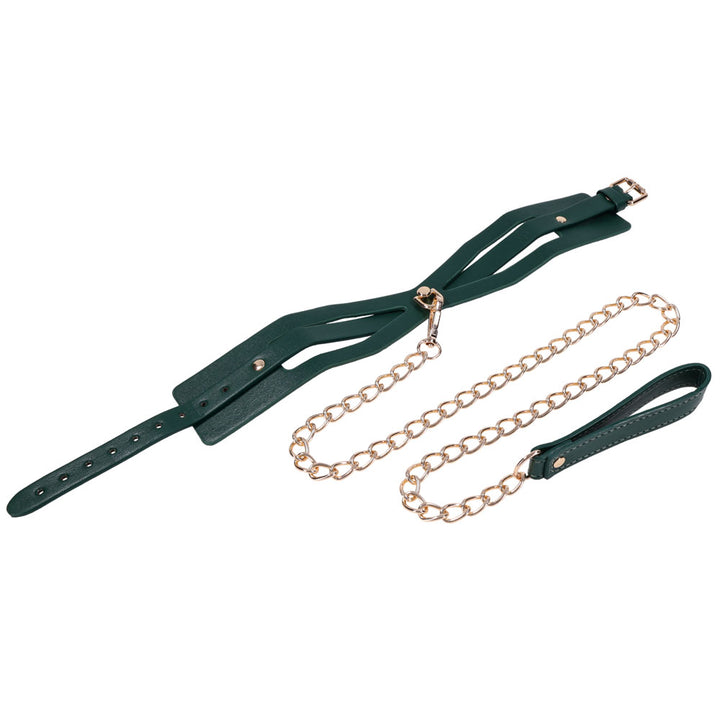 Indica collar laid flat showing the cut-out strap design, leash alongside