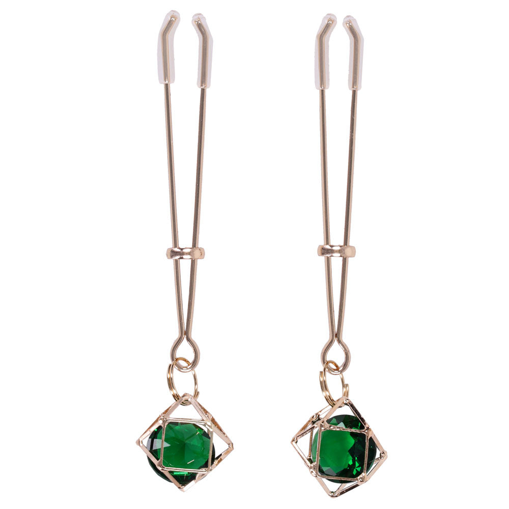 Pair of gold tweezer nipple clips with clear tips and caged green crystals
