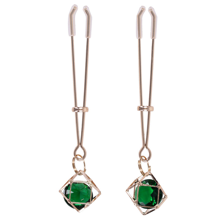 Pair of gold tweezer nipple clips with clear tips and caged green crystals