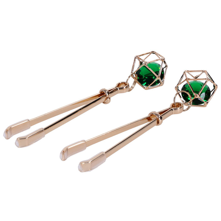 Indica crystal clips laid diagonally with the green gems uppermost