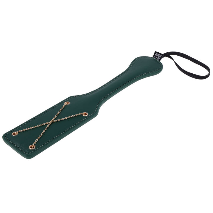 Green Indica paddle lying at an angle, gold chain X and wrist loop in view