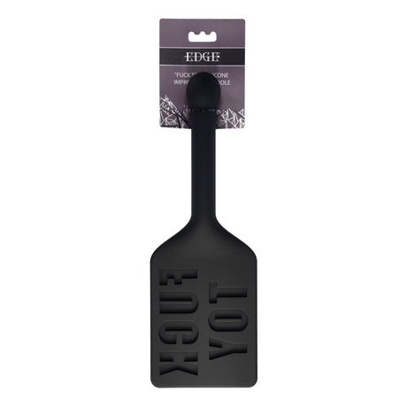 The EDGE FUCK TOY Silicone Paddle features bold cut-outs of FUCK, YOU! on a sleek black silicone surface. Its smooth finish and short handle make it ideal for those who appreciate a cheeky twist, and its stylish packaging ensures a daring statement in any adventurous setting.