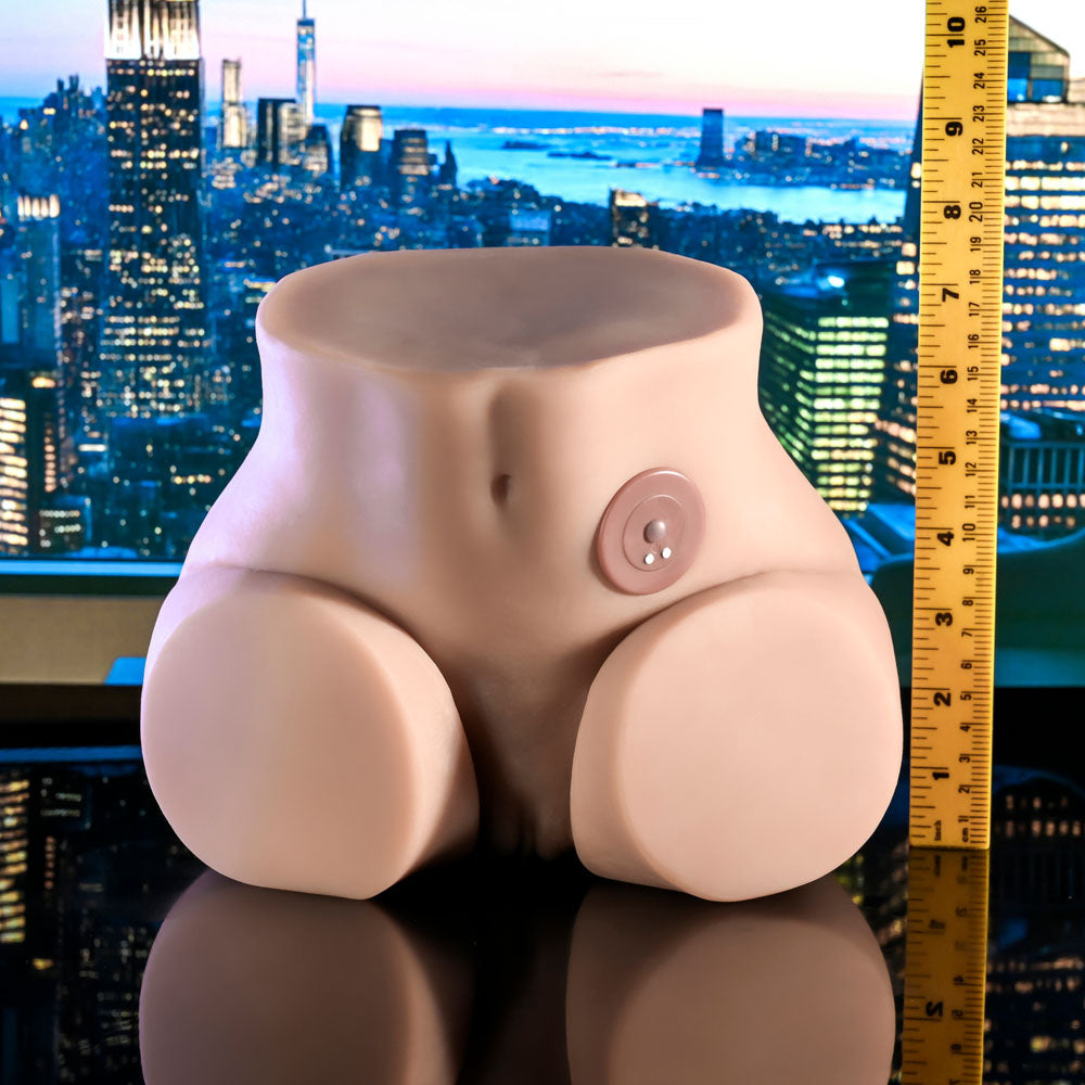 Rumble torso masturbator measured against a ruler beside a city skyline