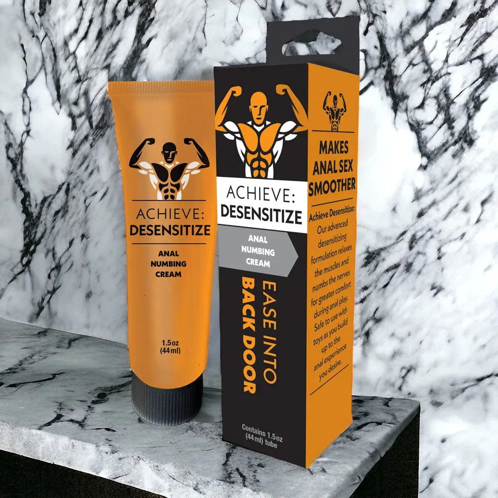 Achieve Desensitize tube and carton staged on a white marble ledge