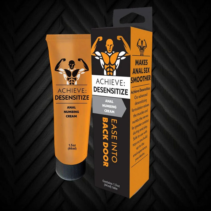 Achieve Desensitize tube and carton against a black textured backdrop