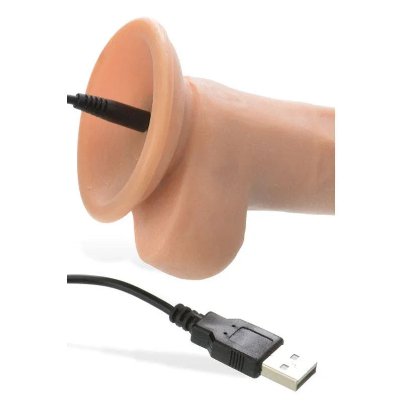 True Feel dildo suction base close-up with the USB charging pin inserted