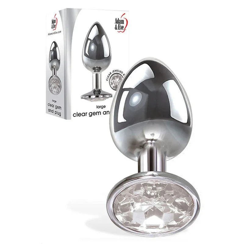 Clear Gem large anal plug in Chrome, jewel base showing, beside its silver box