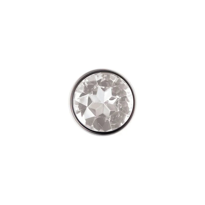 Clear Gem plug base straight on, round clear crystal in a steel rim
