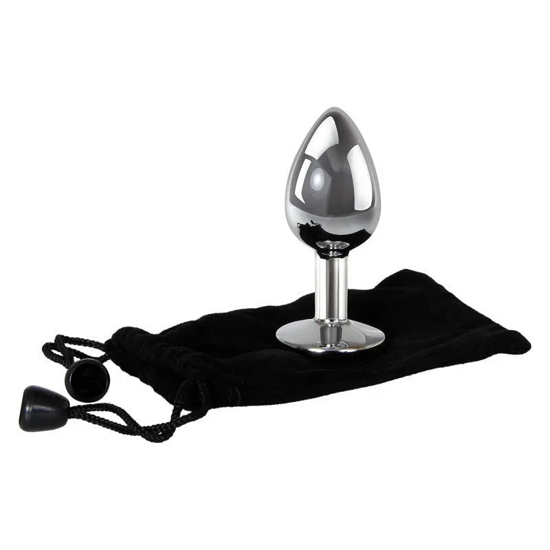 Clear Gem small plug in Chrome standing on its black velvet pouch