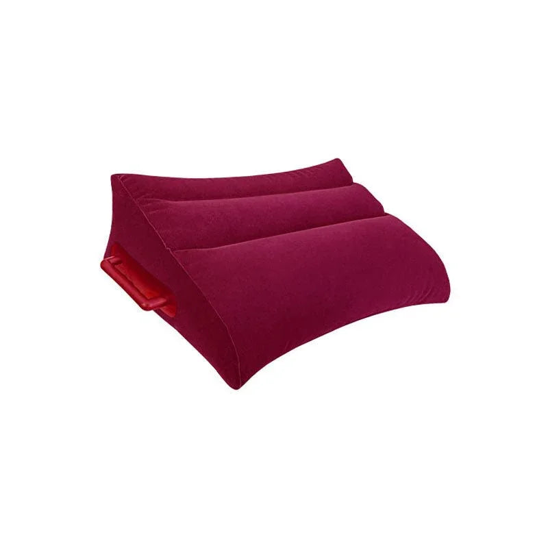 Bolster pillow in burgundy, soft fabric, contoured design for support.