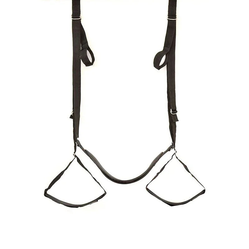 Naughty Couples door swing straps and foot stirrups laid out on white