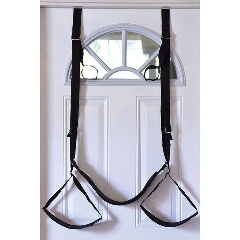 Naughty Couples door swing hanging on a white door