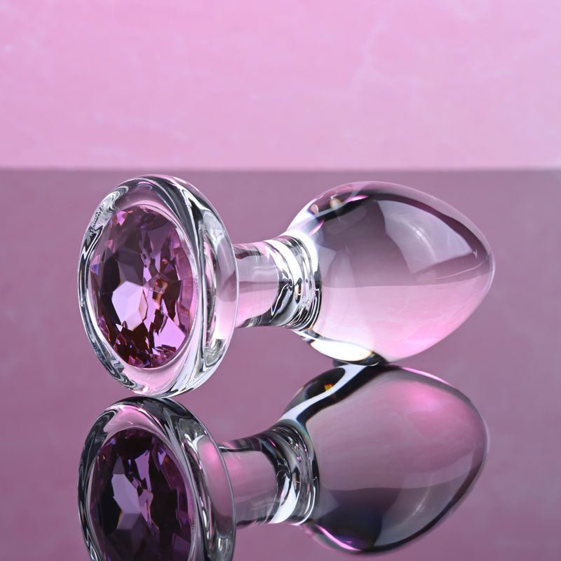 Buy Adam & Eve PINK GEM GLASS PLUG MEDIUM - Clear Glass 8.7 cm Butt Plug with Pink Gem Base – Naughtyhut NZ sex toys online. Discreet delivery & top brands.