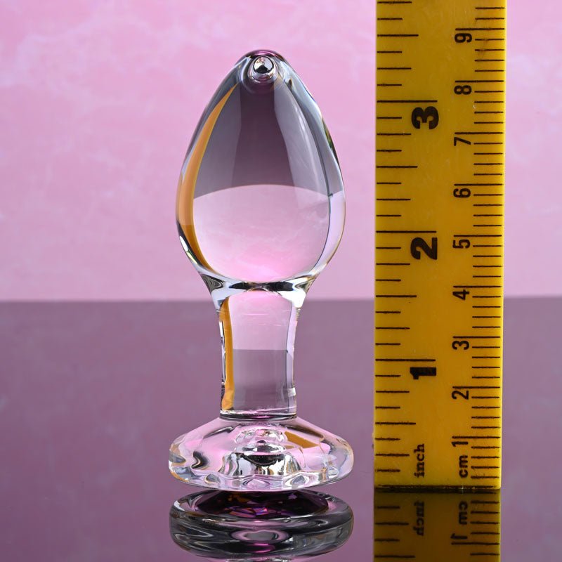 Buy Adam & Eve PINK GEM GLASS PLUG MEDIUM - Clear Glass 8.7 cm Butt Plug with Pink Gem Base – Naughtyhut NZ sex toys online. Discreet delivery & top brands.