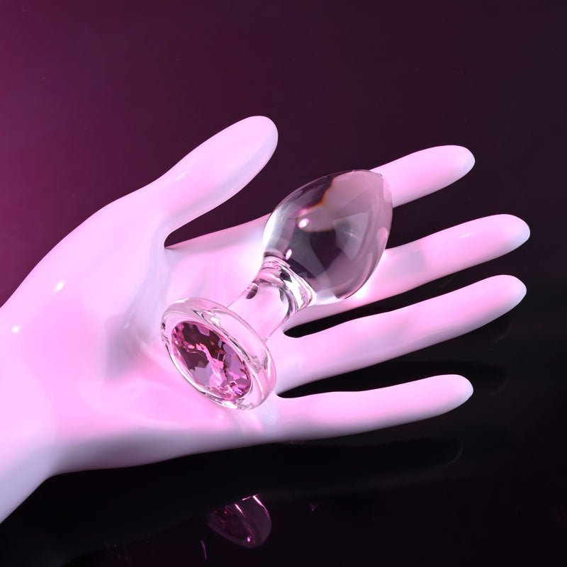 Buy Adam & Eve PINK GEM GLASS PLUG MEDIUM - Clear Glass 8.7 cm Butt Plug with Pink Gem Base – Naughtyhut NZ sex toys online. Discreet delivery & top brands.