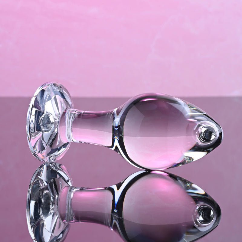Buy Adam & Eve PINK GEM GLASS PLUG MEDIUM - Clear Glass 8.7 cm Butt Plug with Pink Gem Base – Naughtyhut NZ sex toys online. Discreet delivery & top brands.