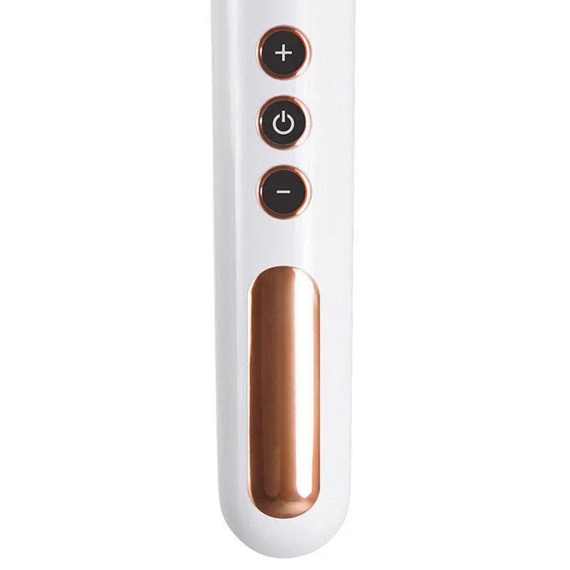 Magic Massager handle close-up, three buttons over the rose-gold panel
