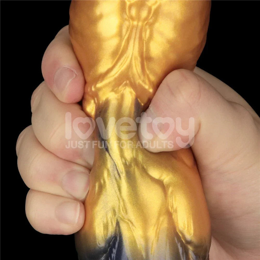 Fist gripping the Aerosx inflatable dildo, compressing it to demonstrate softness