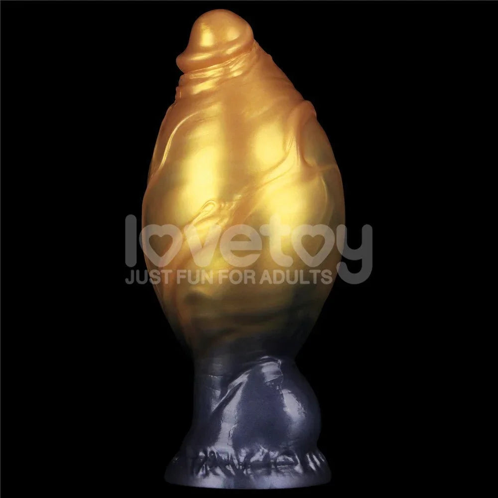 Aerosx 7.5 inch dildo inflated to maximum girth, the gold shaft ballooned out, against black