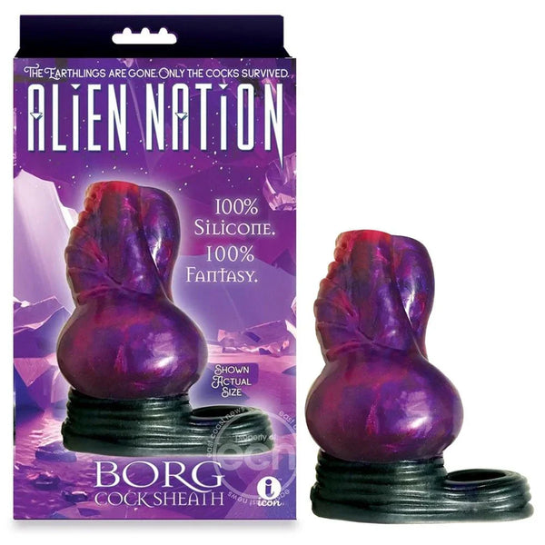 Alien Nation Borg cock sheath in purple with a black ring base, beside its retail box
