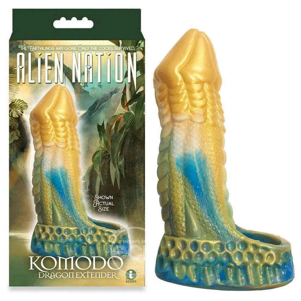Alien Nation Komodo dragon extender in gold and blue, ribbed sleeve beside its retail box
