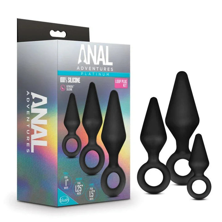 Anal Adventures Platinum Loop Plug Kit, three black plugs beside the rainbow retail box