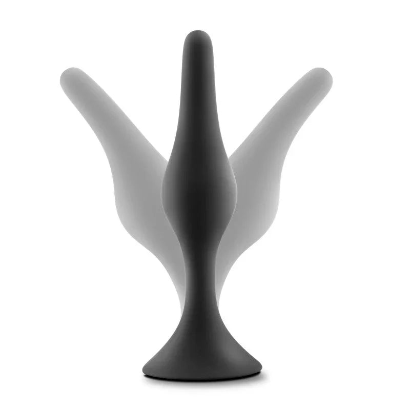 A black beginner plug shown mid-flex, the shaft ghosted through three positions