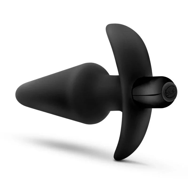 Platinum vibrating plug lying down with the bullet's control end facing the camera