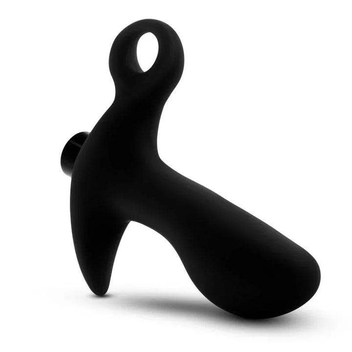 Prostate massager 01 lying on its side with the pull ring raised above the shaft
