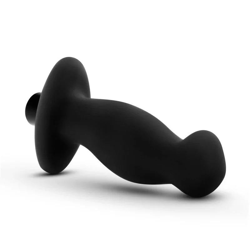 Black prostate massager 02 lying on its side with the bullet motor to the left