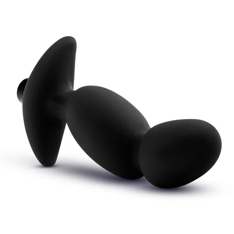 Black prostate massager 04 lying on its side, anchor base to the left