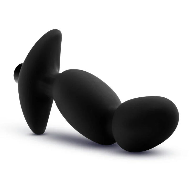 Black prostate massager 04 lying on its side, anchor base to the left