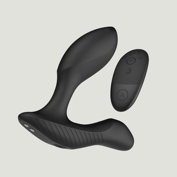 Arcwave Perk black prostate massager shown with its wireless remote