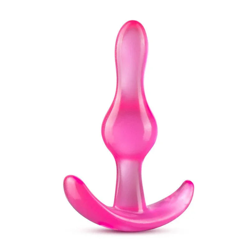 Pink curvy anal plug standing upright, waisted body on a curved T-bar base