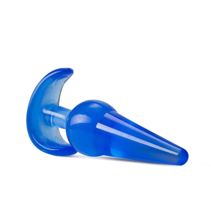 Blue B Yours large plug lying on its side with the tapered tip to the right