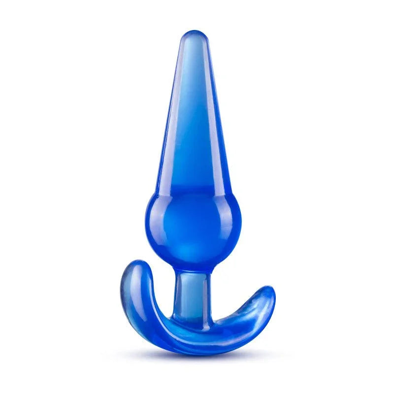 Large translucent blue anal plug upright, tapered tip above a curved T-bar base