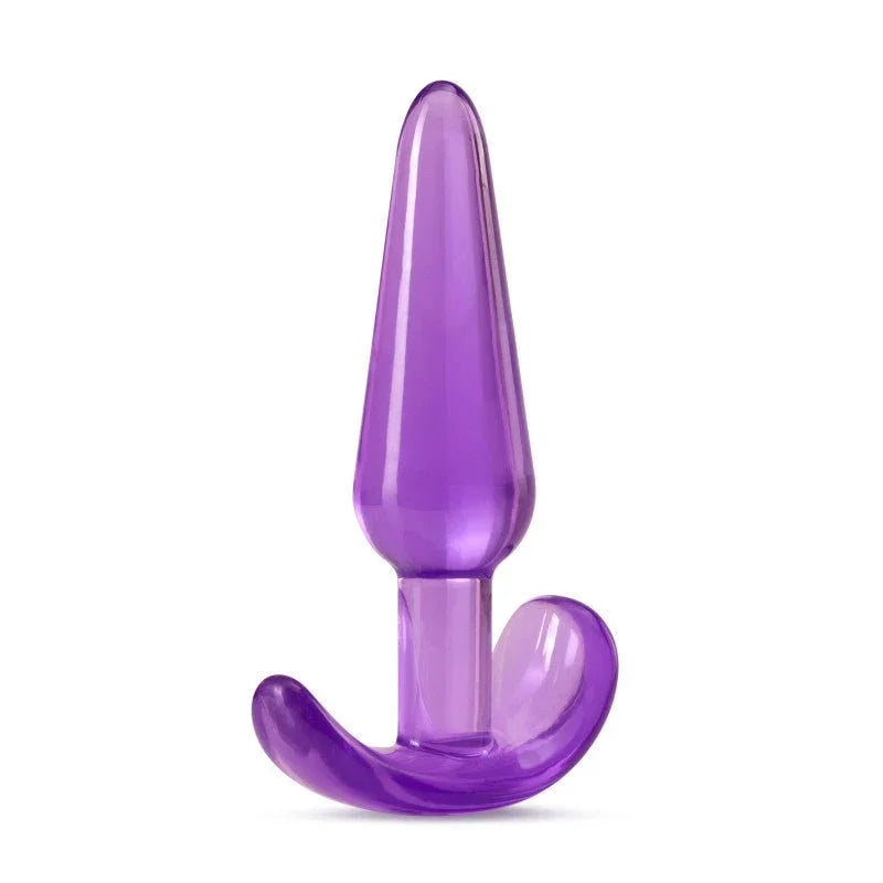 Slim translucent purple anal plug upright on its curved T-bar base
