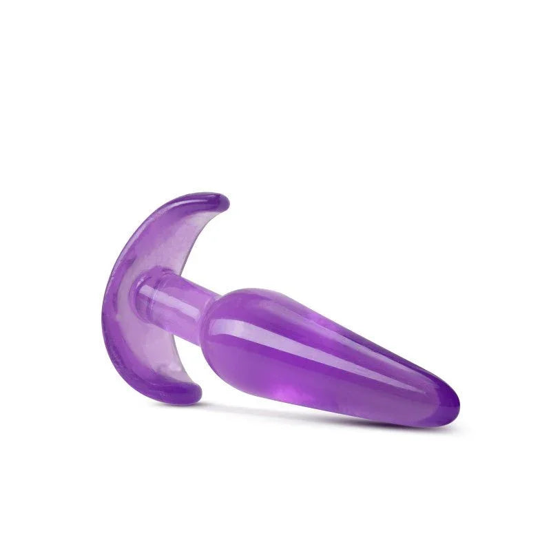 Purple B Yours slim plug lying on its side, tapered tip pointing right