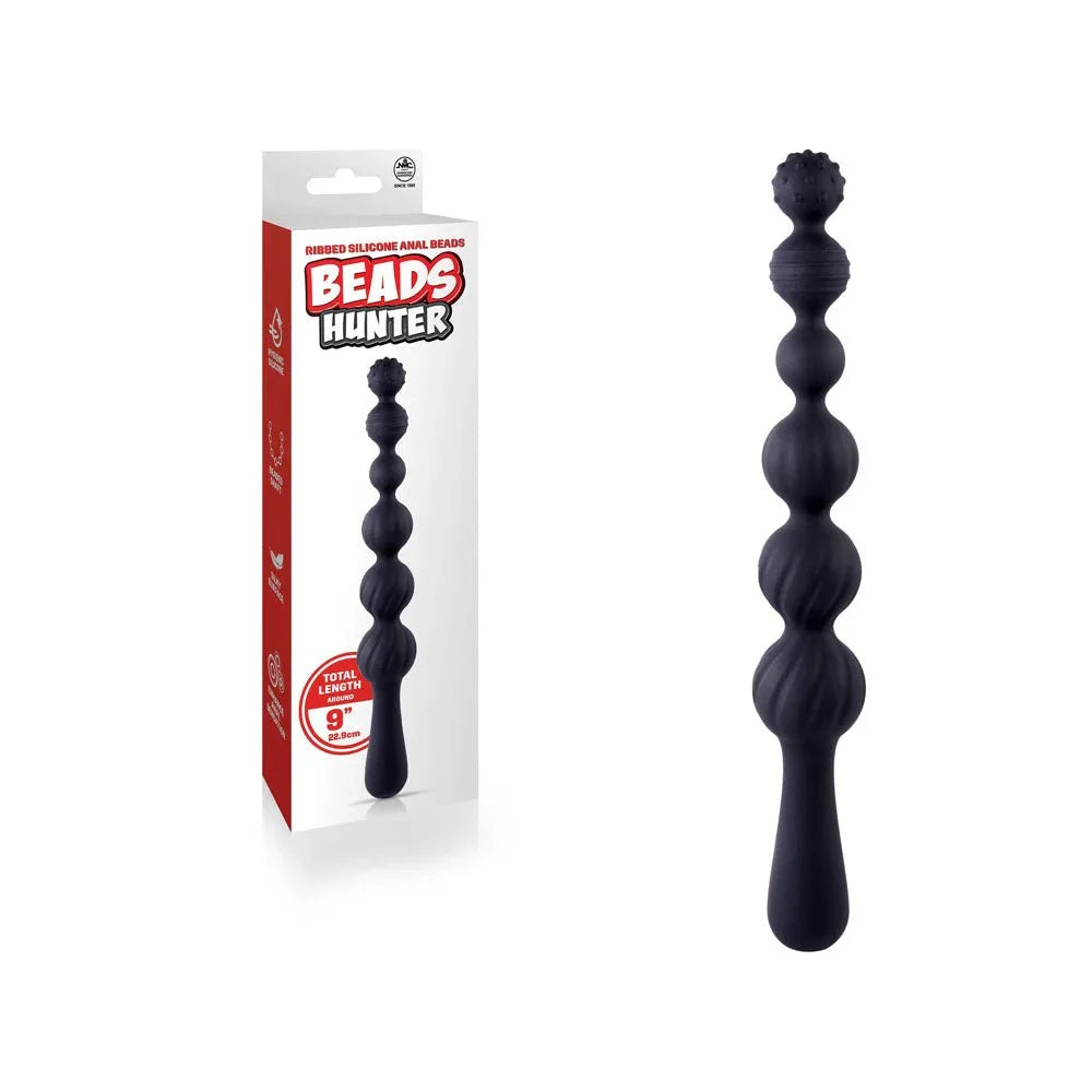 Beads Hunter 22.9 cm anal beads in Black, bulbed shaft upright beside its red retail box