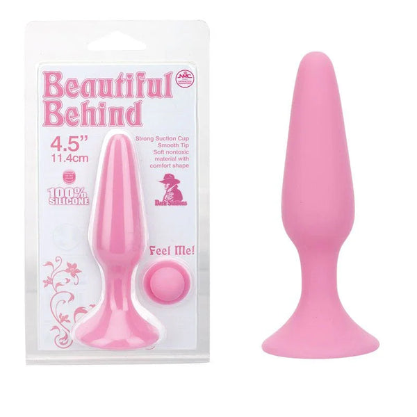 Beautiful Behind 11.5 cm butt plug in Pink, tapered plug beside its blister card