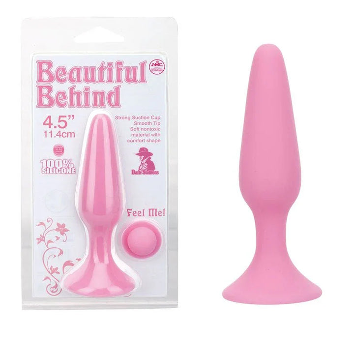 Beautiful Behind 11.5 cm butt plug in Pink, tapered plug beside its blister card